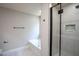 Modern bathroom with a soaking tub and glass-enclosed shower with designer tile at 2725 Gross Ave, Wake Forest, NC 27587