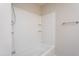 Bathroom with a built in shower and tub combo featuring tile surround at 2725 Gross Ave, Wake Forest, NC 27587