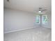 Bedroom with a ceiling fan, neutral colored walls, carpet and bright windows at 2725 Gross Ave, Wake Forest, NC 27587