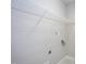 Laundry room with neutral walls and a wire rack at 2725 Gross Ave, Wake Forest, NC 27587