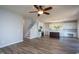 Open concept living space with views of kitchen, modern floors, and plenty of light at 2725 Gross Ave, Wake Forest, NC 27587