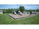 Well maintained community playground with slides and swings at 2725 Gross Ave, Wake Forest, NC 27587