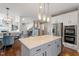 Open concept kitchen with a large center island, stainless steel appliances, and seamless flow at 2941 Grandview Heights Lane Ln, Raleigh, NC 27614