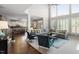 Bright living room features soaring windows, plush seating, and an open layout at 2941 Grandview Heights Lane Ln, Raleigh, NC 27614