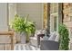 Cozy porch seating area with cushioned chairs, a decorative rug, and lush greenery for a relaxing outdoor space at 2941 Grandview Heights Lane Ln, Raleigh, NC 27614