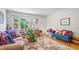 Inviting living room with hardwood floors, natural light, and comfortable seating at 302 Bradley St, Burlington, NC 27215