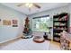 Fun bedroom with a Christmas Tree and bookcase at 3217 Enchanting Way, Raleigh, NC 27616