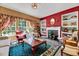 Comfortable living room featuring a fireplace and built-in shelves for elegant displays at 3217 Enchanting Way, Raleigh, NC 27616