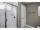 Modern bathroom featuring a walk-in shower with white subway tile and a glass door at 331 Bridle Brook Way, Fuquay Varina, NC 27526
