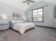 Bright bedroom with vaulted ceiling, large window, and neutral decor at 335 Glenn St, Franklinton, NC 27525