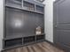 Mudroom with custom built-ins, hooks, and bench seating for an organized entryway at 335 Glenn St, Franklinton, NC 27525