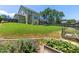 Well-manicured backyard with a deck, patio and privacy fence at 3504 Regent Pines Dr, New Hill, NC 27562