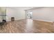 Unfurnished basement featuring vinyl flooring, a sliding glass door, and natural light at 3504 Regent Pines Dr, New Hill, NC 27562