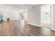 Partially finished basement featuring vinyl flooring, a sliding glass door, and open layout at 3504 Regent Pines Dr, New Hill, NC 27562