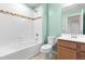 Fresh bathroom with white tile, mosaic trim, and a tub/shower combo at 3504 Regent Pines Dr, New Hill, NC 27562