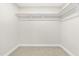 Walk-in closet with a rod and shelving offers plenty of storage at 3504 Regent Pines Dr, New Hill, NC 27562