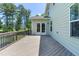 Enjoy a spacious deck with french doors and peaceful view at 3504 Regent Pines Dr, New Hill, NC 27562