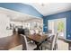 Open dining room that connects the kitchen to living room, great for gathering at 3504 Regent Pines Dr, New Hill, NC 27562