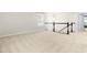Bright landing features neutral carpeting, a stair railing, and a window at 3504 Regent Pines Dr, New Hill, NC 27562