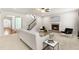 Cozy living room with a stone fireplace, plush seating, and an inviting atmosphere, ideal for relaxation at 3504 Regent Pines Dr, New Hill, NC 27562