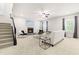 Spacious living room featuring a fireplace, comfortable seating, and plenty of natural light for relaxation at 3504 Regent Pines Dr, New Hill, NC 27562