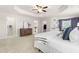 Bright main bedroom featuring tray ceiling, closet and ensuite bath at 3504 Regent Pines Dr, New Hill, NC 27562