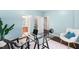 Stylish home office with a glass desk and ample space, perfect for remote work and study at 3504 Regent Pines Dr, New Hill, NC 27562