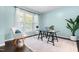 Bright office space featuring a large window, modern desk, and elegant decor, perfect for productivity at 3504 Regent Pines Dr, New Hill, NC 27562