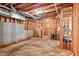 Unfinished basement with exposed wooden framing and concrete flooring, ready for customization at 3606 Dairy Pond Pl, Durham, NC 27705
