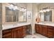 Dual vanities and decorative mirrors highlight this inviting bathroom at 3606 Dairy Pond Pl, Durham, NC 27705