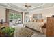 Tranquil bedroom with natural light and a decorative tray ceiling at 3606 Dairy Pond Pl, Durham, NC 27705