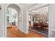 Elegant dining room with hardwood floors, chandelier, and access to the living room at 3606 Dairy Pond Pl, Durham, NC 27705
