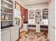 Bright home office features custom built-ins and a comfortable layout at 3606 Dairy Pond Pl, Durham, NC 27705