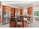 Well-appointed kitchen featuring stainless steel appliances, granite countertops, and ample wood cabinets at 3606 Dairy Pond Pl, Durham, NC 27705