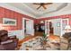 Inviting living room features hardwood floors, tray ceilings, and access to multiple rooms at 3606 Dairy Pond Pl, Durham, NC 27705