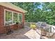 Spacious outdoor patio featuring a grill and comfortable seating, perfect for entertaining at 3606 Dairy Pond Pl, Durham, NC 27705