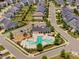 Aerial view showcasing the community pool, playground, and surrounding neighborhood at 408 Brierley Dr, Apex, NC 27523