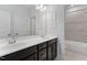 This bathroom features a large mirror and double sinks, offering a spacious and functional space at 408 Brierley Dr, Apex, NC 27523