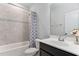 This bathroom features a shower and bathtub combination at 408 Brierley Dr, Apex, NC 27523