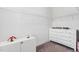This closet features white walls, a shelf, and carpet flooring at 408 Brierley Dr, Apex, NC 27523