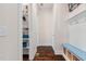 Mudroom features a built-in bench with storage baskets and hooks for organization at 408 Brierley Dr, Apex, NC 27523