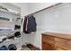 Well-organized walk-in closet with shelving and hanging rods, providing functional storage and easy access at 408 Brierley Dr, Apex, NC 27523
