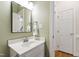 Bathroom with a mirror above a sink and vanity at 4309 Omni Pl, Raleigh, NC 27613