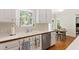 Kitchen featuring a double sink and stainless-steel dishwasher at 4309 Omni Pl, Raleigh, NC 27613