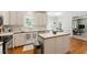 Spacious kitchen with an island and hardwood floors at 4309 Omni Pl, Raleigh, NC 27613