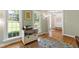 Home office with hardwood floors, ample natural light and adjacent living space at 4309 Omni Pl, Raleigh, NC 27613