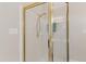 Shower with gold trim at 4309 Omni Pl, Raleigh, NC 27613