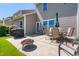 Cozy patio with outdoor seating, grill, and fire pit, perfect for relaxing and entertaining at 437 Excalibur Dr, Morrisville, NC 27560