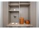 A designated dog station with built-in storage, a water faucet, and food bowls for your furry friends at 4412 Pamlico Dr, Raleigh, NC 27609