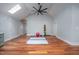Bright and spacious gym or yoga room featuring hardwood floors at 4412 Pamlico Dr, Raleigh, NC 27609